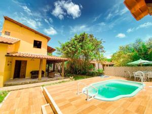 Πισίνα στο ή κοντά στο Casa amarela Boipeba Bahia