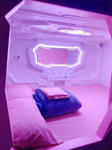Postel nebo postele na pokoji v ubytování Mermaid Space Capsule Hostel Palermo