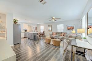 a living room with a couch and a table at Warm & Comfy 4BR near NRG, Stadium Medical and CTR in Houston