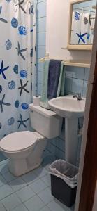 Koupelna v ubytování Rooms Palmeras + 37 fotografií