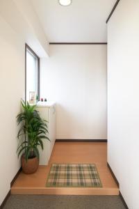 Postel nebo postele na pokoji v ubytování Westeria201 ペット子供歓迎JR春日井駅より徒歩3分長期滞在に最適