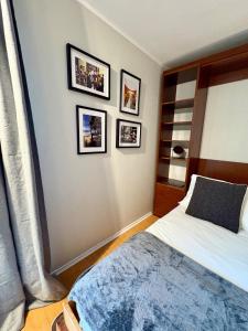 Postel nebo postele na pokoji v ubytování Apt Santiago Lastarria
