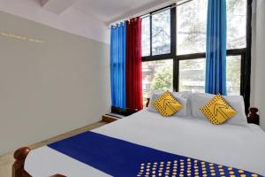 Foto Bangalore’is asuva majutusasutuse SPOT ON Canton Lodging And Boarding galeriist