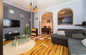 a living room with a couch and a glass table at Cdi941 in Slivnica