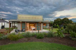 a modern house with a patio in a yard at Studio 367 in Tamworth