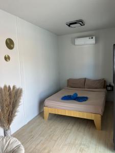 Postel nebo postele na pokoji v ubytování Saudade Bungalows and Bar