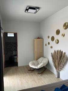 Posezení v ubytování Saudade Bungalows and Bar