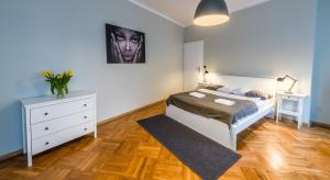 Posteľ alebo postele v izbe v ubytovaní Sereno Apartments