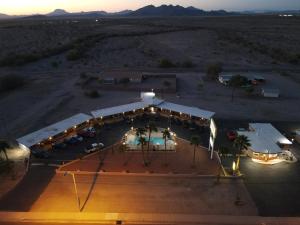 an overhead view of a building in the desert at Palms Inn in Gila Bend