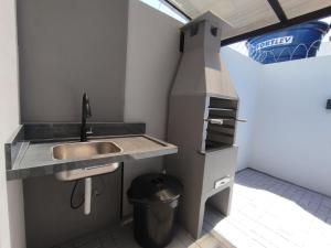 Køkken eller tekøkken på Casa Duplex a 1km do Beto Carrero e 200m da praia