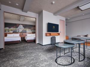 Μια τηλεόραση ή/και κέντρο ψυχαγωγίας στο MONday Apart Premium OSAKA NAMBA WEST
