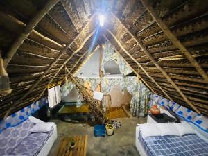 Letto o letti in una camera di The Forest Edge Resort