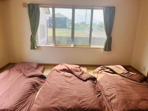 Letto o letti in una camera di Nest Kisarazu