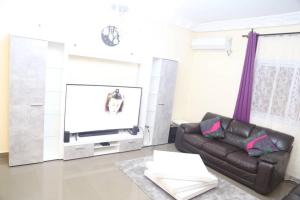 TV a/nebo společenská místnost v ubytování Fots Appartement