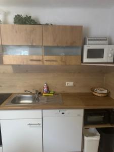 Kuchyň nebo kuchyňský kout v ubytování Kleines Häuschen im Tauernstädtchen Gmünd