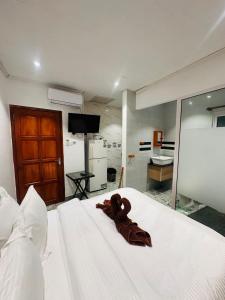 Cama o camas de una habitación en Happy stay villa