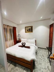 Cama o camas de una habitación en Happy stay villa