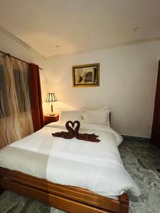Cama o camas de una habitación en Happy stay villa