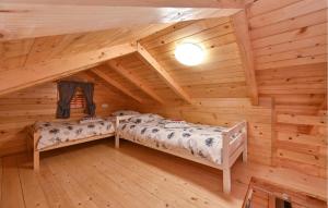 Posteľ alebo postele v izbe v ubytovaní Beautiful Home In Radakovo With Sauna