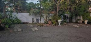 Giardino di VThree Family House