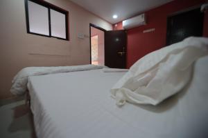 Postel nebo postele na pokoji v ubytování Al Huda + 7 fotografií