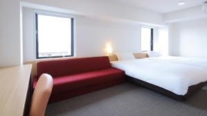Katil atau katil-katil dalam bilik di AB Hotel Kani