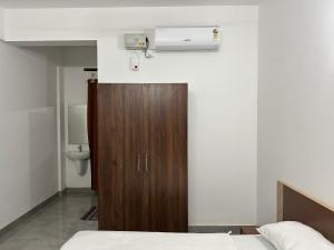 Foto sihtkohas Vaduvanchal asuva majutusasutuse Jayalakshmi Residency galeriist