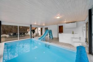 The swimming pool at or close to Large Pool House For 20 People, Where Hunting Is Allowed In The Adjacent Forest,