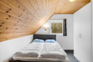 A bed or beds in a room at Large Pool House For 20 People, Where Hunting Is Allowed In The Adjacent Forest,