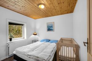 A bed or beds in a room at Large Pool House For 20 People, Where Hunting Is Allowed In The Adjacent Forest,