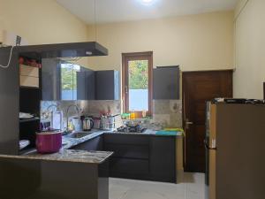 Kuchyň nebo kuchyňský kout v ubytování Villa Infinity Negombo