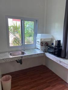 Η κουζίνα ή μικρή κουζίνα στο Magic View Apartments Koh Tao