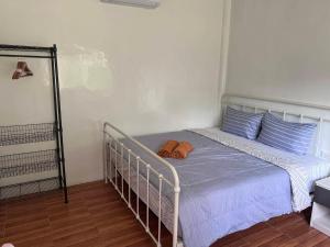 Ένα ή περισσότερα κρεβάτια σε δωμάτιο στο Magic View Apartments Koh Tao