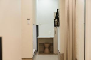 Fotografie z fotogalerie ubytování HOTEL minimumms女性専用カプセルホテルWomen only hotel v destinaci Naha