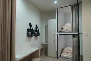 Koupelna v ubytování HOTEL minimumms女性専用カプセルホテルWomen only hotel