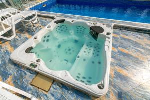 阿克拉Aster Luxury Apt close to Airport & Mall with Rooftop pool & gym的相册照片