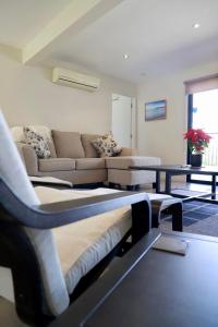 Area soggiorno di 31A Enjoy Your Stay