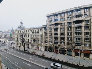 Nespecifikovaný výhled na destinaci Bukurešť nebo výhled na město při pohledu z apartmánu