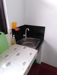 a bathroom with a sink in a room at Gamage Villa Tangalle in Tangalle +17 photos