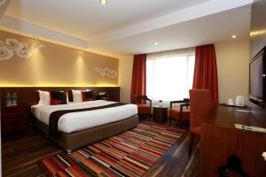 Voodi või voodid majutusasutuse Hotel Shambala toas