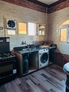 Kuchyň nebo kuchyňský kout v ubytování Apartment in asala dahab