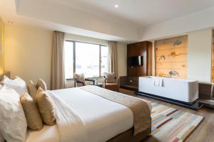 Voodi või voodid majutusasutuse Hotel Shambala toas