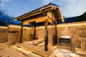 Fotografie z fotogalerie ubytování Shanhai Travel Xianju Laoshan Poetry and Wine Culture Theme Courtyard v destinaci Čching-tao