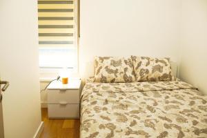 Postelja oz. postelje v sobi nastanitve Apartman Kumric Divcibare Kota 992