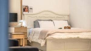 En eller flere senge i et værelse på Gapyeong Namian Pool Villa