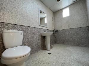 Koupelna v ubytování Chang Ti Metropolis Commercial Hotel