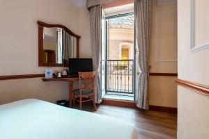 Postel nebo postele na pokoji v ubytování Hotel Hiberia