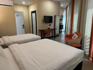 S Hotel Seberang Jaya客房内的一张或多张床位