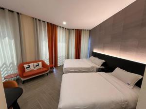 S Hotel Seberang Jaya客房内的一张或多张床位