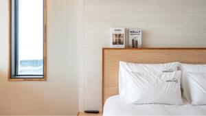 Katil atau katil-katil dalam bilik di Gyeongju Adria Stay Pension +5 gambar